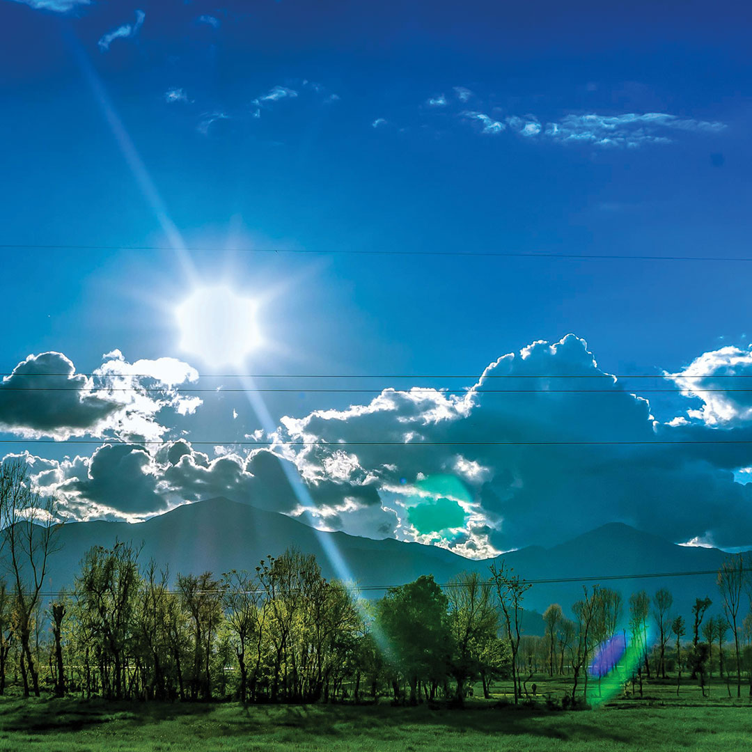 Summer sun in blue sky